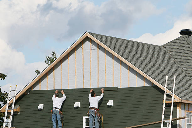 Professional Emergency Siding Repair technician working in Crystal Beach, FL